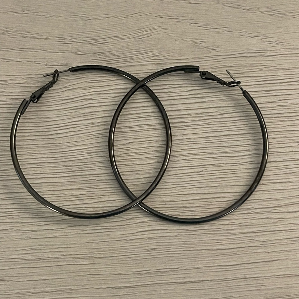Black shiny metal hoops